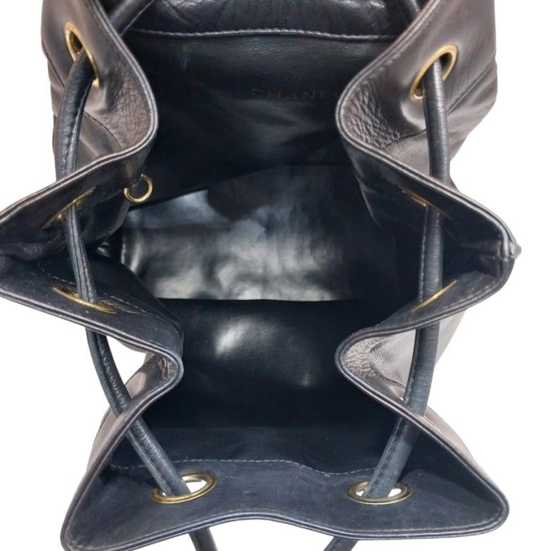 Black Lambskin CC Logo Drawstring Sling Bag Backpack